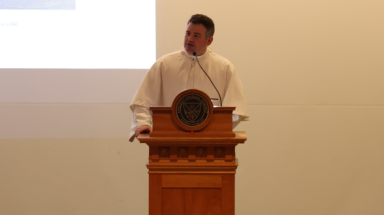 Fr. Dougherty delivers a lecture